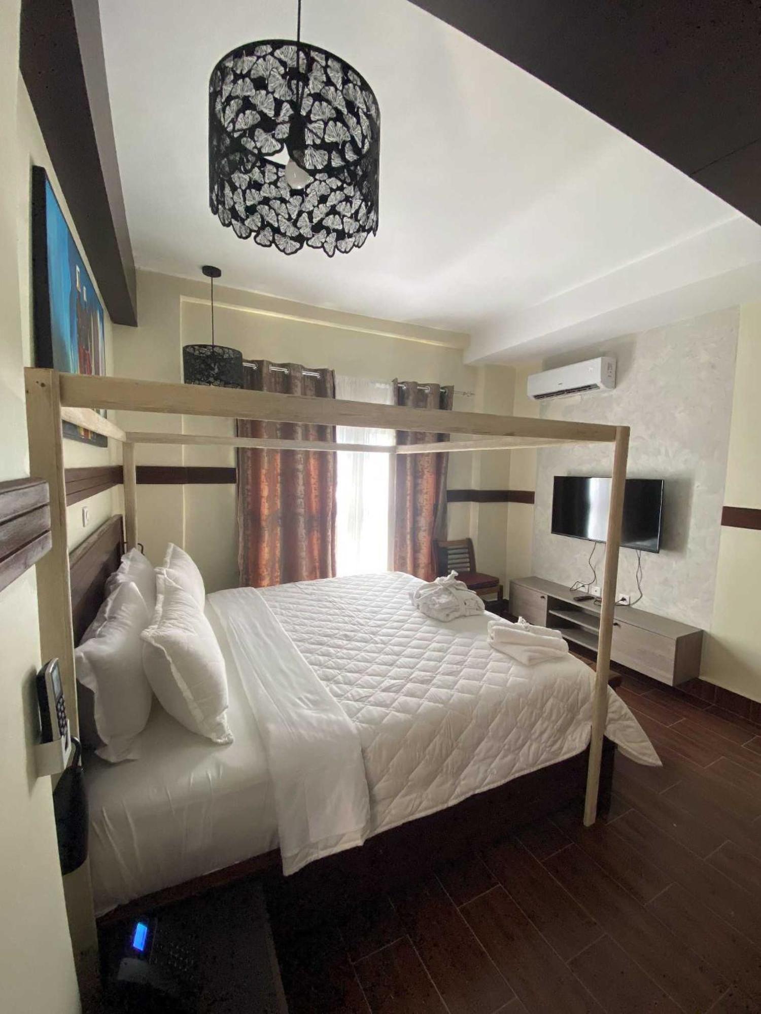 Boutique Hotel Pavillon Abidjan Szoba fotó